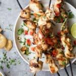 Grilled Sesame Lime Chicken served with a homemade Spicy Thai Peanut Sauce made in less than 40 minutes. Ya'll, I'm warning you just make a double batch of the sauce.