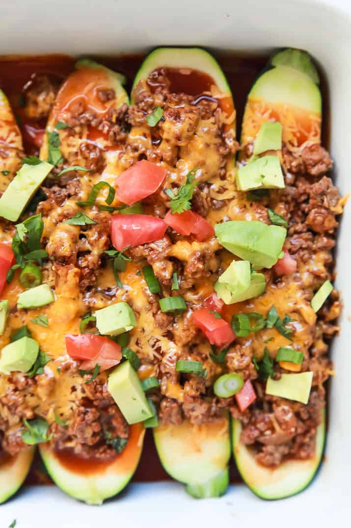 Ground Beef Enchilada Zucchini Boats - a healthy gluten free version of classic Beef Enchiladas. A little over 30 minutes to make but well worth it for the bold flavors and a calorie count of 222! | joyfulhealthyeats.com