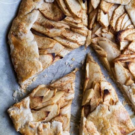 This Rustic Cardamom Apple Galette topped with a Maple Mascarpone is the thing pie dreams are made of. It's easy to make, mind blowing in flavor, and Gluten Free .. you'll fall in love! | joyfulhealthyeats.com