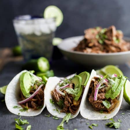 These Paleo Crock Pot Balsamic Braised Short Rib Tacos will be your new favorite Crock Pot recipe! Cuz Tacos... duh! They are sweet & spicy, easy, healthy, and totally deliver on flavor! You're gonna be in love! | joyfulhealthyeats.com #glutenfree