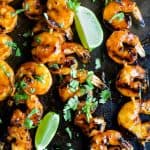 Honey Sriracha Grilled Shrimp an easy 30 minute meal or appetizer. These are hands down the BEST grilled shrimp you'll ever have and the Honey Sriracha Glaze is swoon worthy!