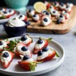 Patriotic Cheesecake Stuffed Strawberries - an easy healthy recipe that tastes like strawberry cheesecake but without all the calories!