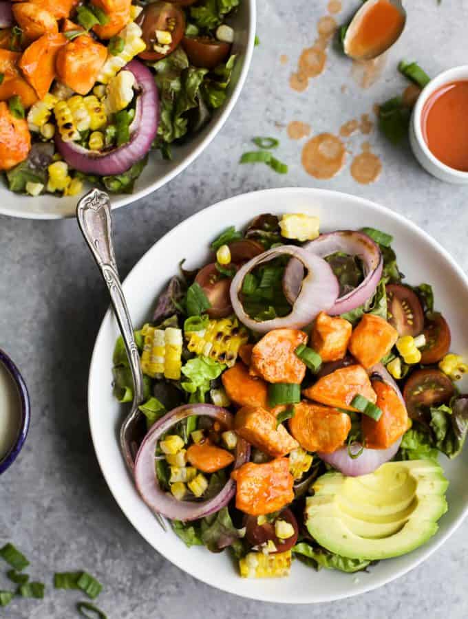 Grilled Buffalo Chicken Salad an easy 30 minute recipe smothered in buffalo sauce and filled with grilled vegetables for one delicious bite! Summer salads never tasted so good! | gluten free recipes