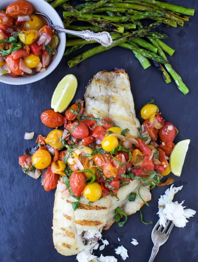 Grilled Red Snapper topped with a Roasted Red Pepper and Charred Tomato Relish for a light and fresh 30 Minute meal perfect for summer! | paleo recipes | gluten free