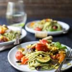 Basil Pesto Pasta tossed with fresh Grilled Vegetables a 30 minute meal your family will love! This light fresh gluten free pasta recipe will quickly become a summer favorite!
