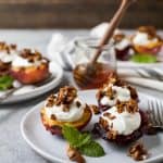 Grilled Stone Fruit topped with Vanilla Yogurt & Homemade Granola - an easy summer dessert recipe that's light, refreshing, and so easy to make!