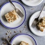 Moist Healthy Zucchini Cake made with applesauce and honey then topped with a light Cream Cheese Frosting! It's the ultimate dessert recipe or late night sweet treat!