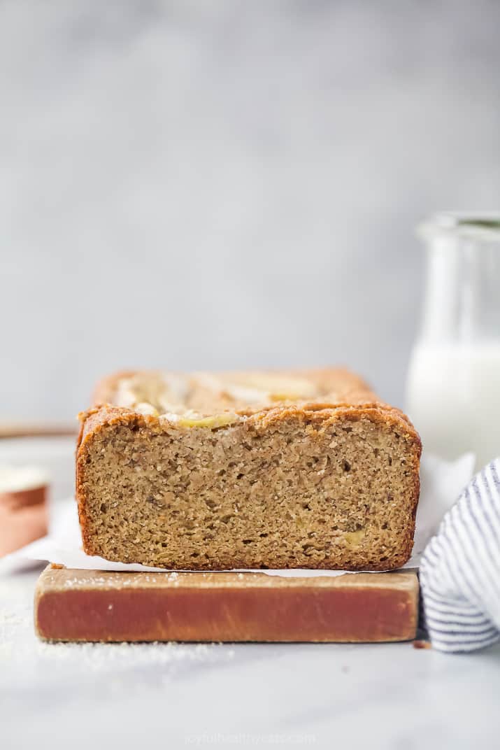 A Loaf of Almond Flour Banana Bread With One Slice Removed