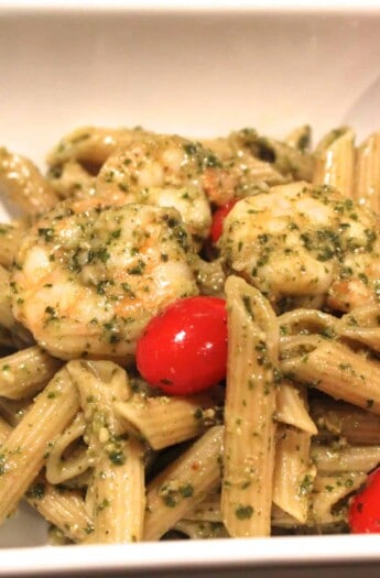 A Bowl of Pesto Pasta with Shrimp and Cherry Tomatoes