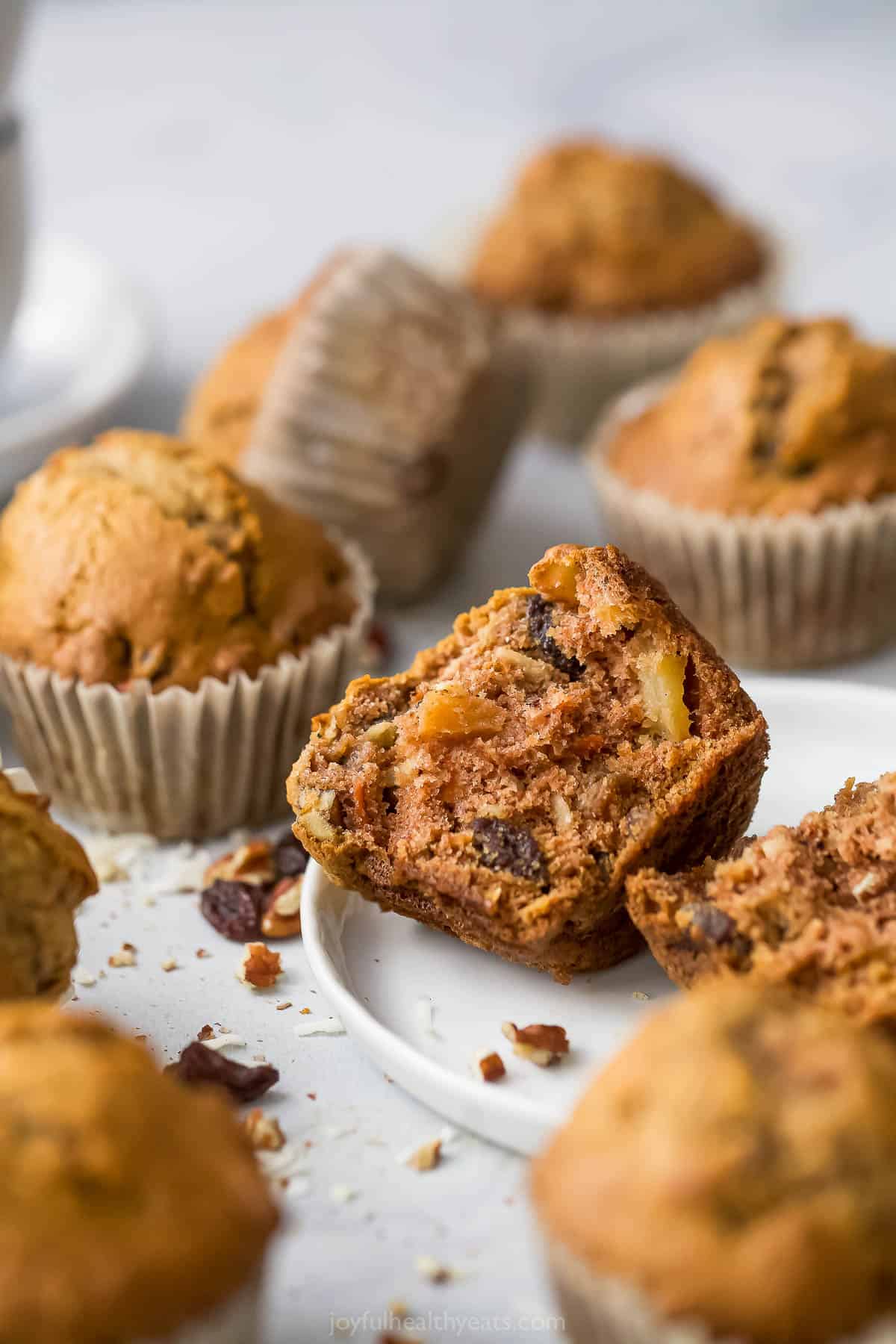 Half of a fluffy breakfast muffin on a plate. 