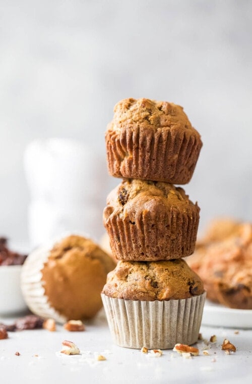 Three stacked morning glory muffins.
