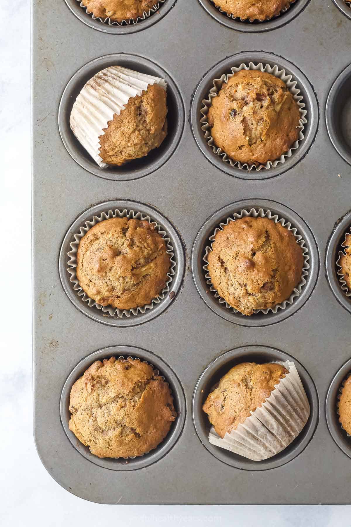 Baked muffins in the baking tray. 