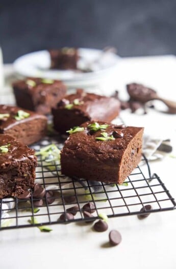 Zucchini Chocolate Chip Brownies that are oil, butter, and egg free AND naturally sweetened! These brownies are extra chocolatey, loaded with zucchini, slightly sweet, and perfectly guilt free - you're gonna love them! | joyfulhealthyeats.com