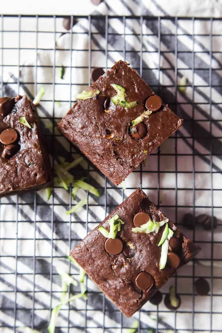 Zucchini Chocolate Chip Brownies that are oil, butter, and egg free AND naturally sweetened! These brownies are extra chocolatey, loaded with zucchini, slightly sweet, and perfectly guilt free - you're gonna love them! | joyfulhealthyeats.com