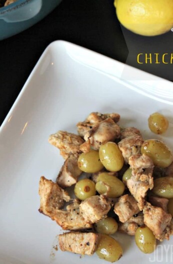 A serving of Spiced Chicken & Grapes on a plate.