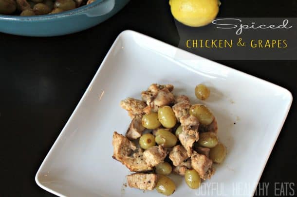 A serving of Spiced Chicken & Grapes on a plate.
