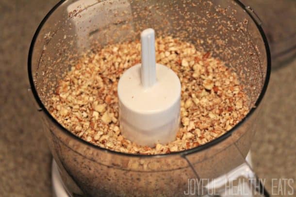 Ground nuts in a food processor bowl