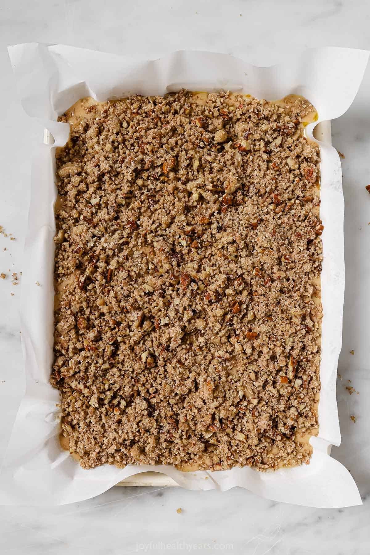 Batter in the baking pan with the streusel topping before baking.