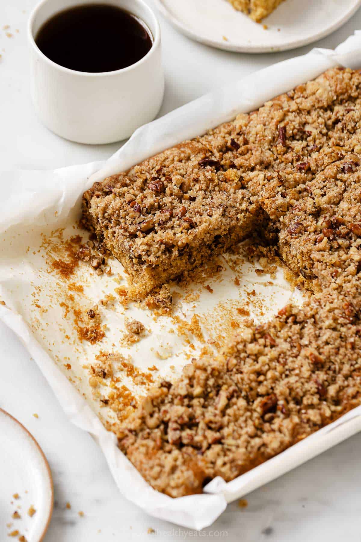 Sliced coffee cake in the baking pan. 