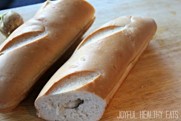 Two pieces of French Bread sliced lengthwise