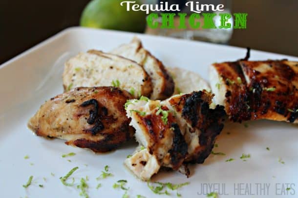 Seven Pieces of Tequila Lime Chicken on a Plate Next to a Lime