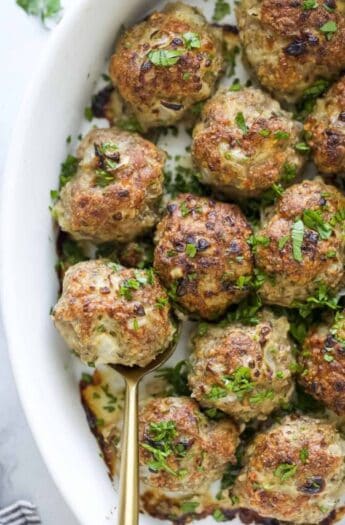 Juicy turkey meatballs with fresh parsley on top.