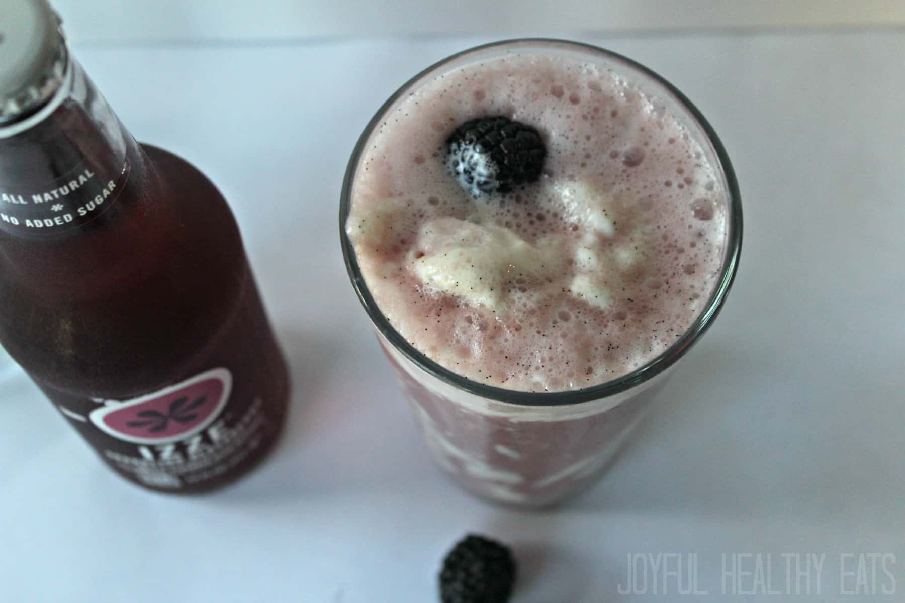 Top view of Blackberry Vanilla Bean Ice Cream Soda in a glass