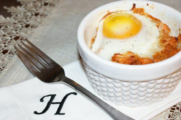 Sweet potato egg bake in a white ramekin