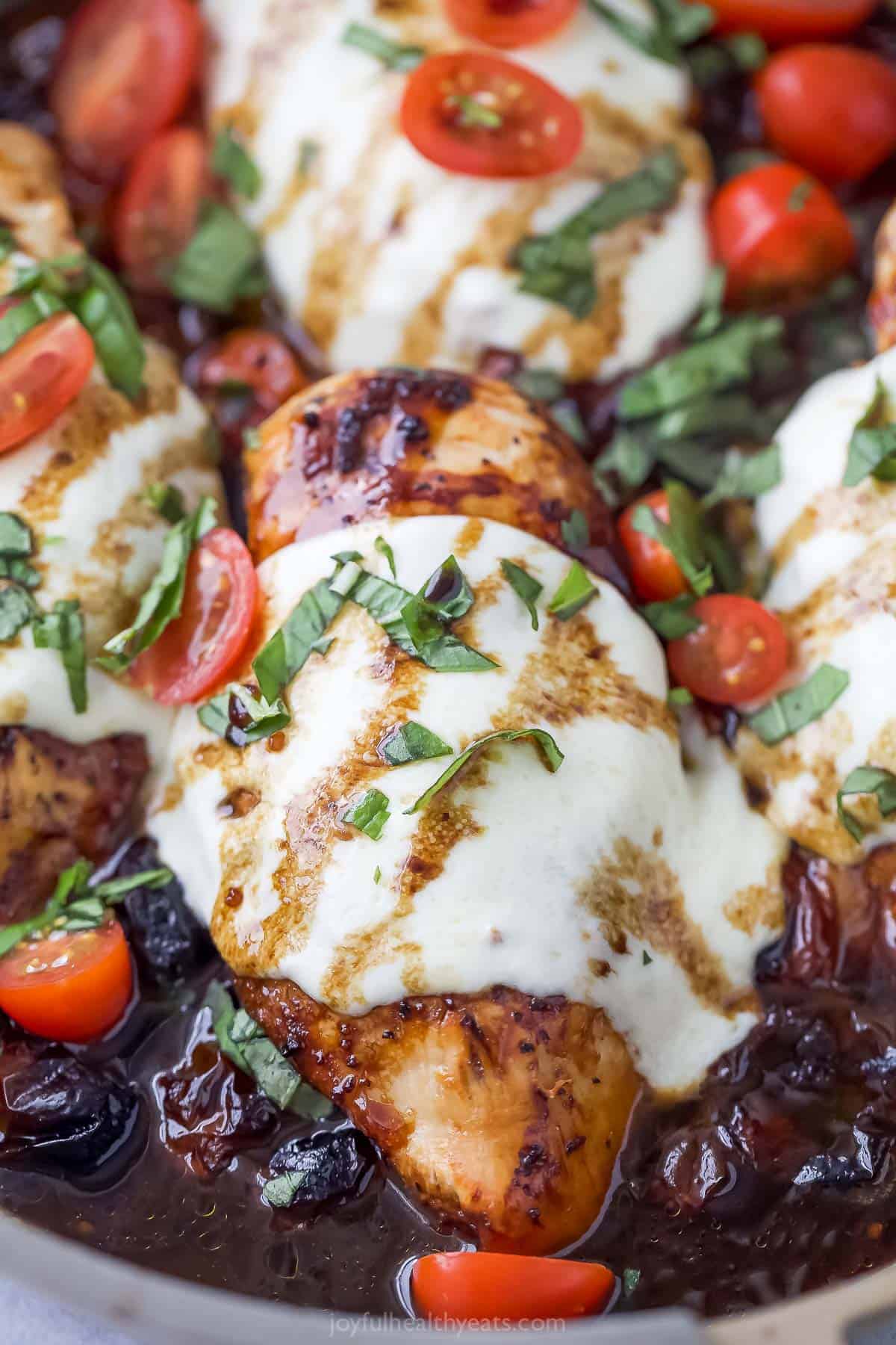 Juicy chicken with cherry tomatoes, mozzarella, and basil.