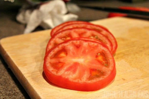 Sliced tomato on a cutting board