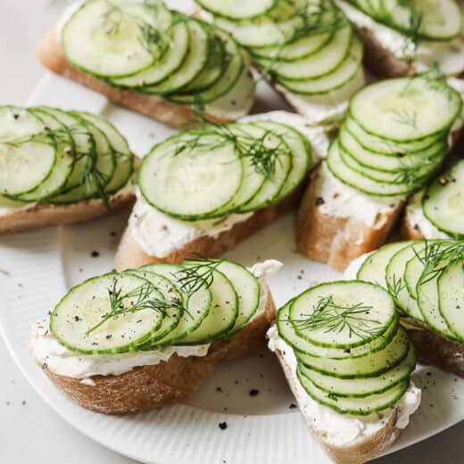 Landscape photo of cucumber sandwiches.