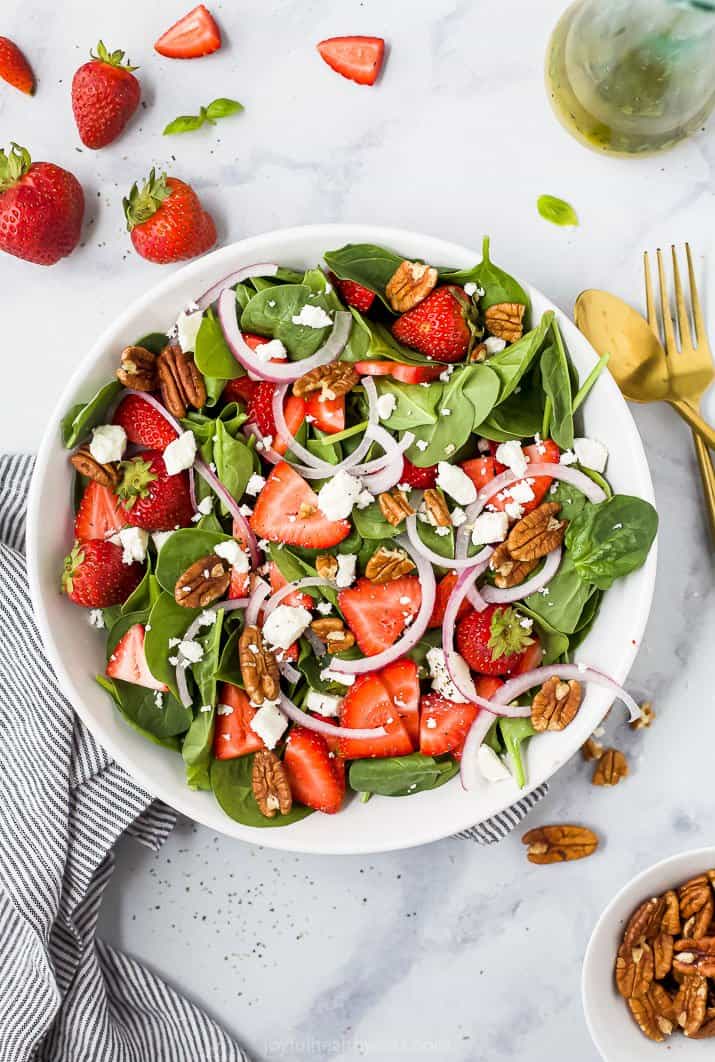 strawberry spinach salad in a bowl