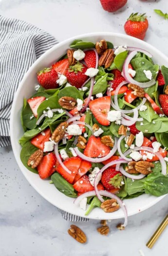 strawberry spinach salad in a bowl