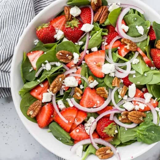 strawberry spinach salad in a bowl