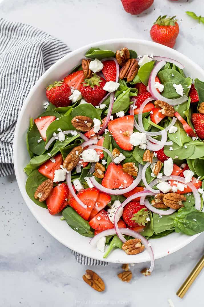 strawberry spinach salad in a bowl