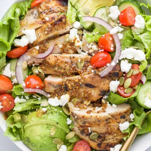 Bowl of chicken and avocado salad.