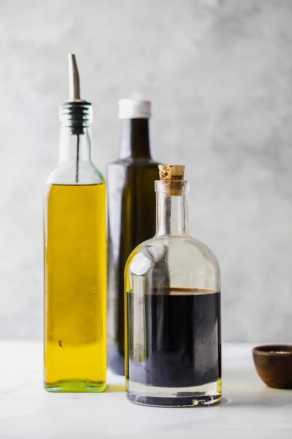 picture of bottles filled with balsamic vinegar and olive oil