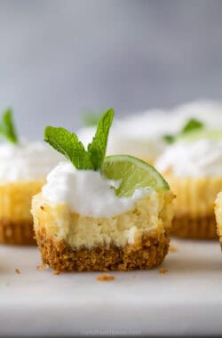 Mini key lime pie bitten into to show layers