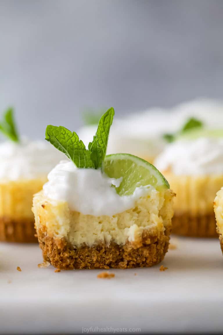 Mini key lime pie bitten into to show layers