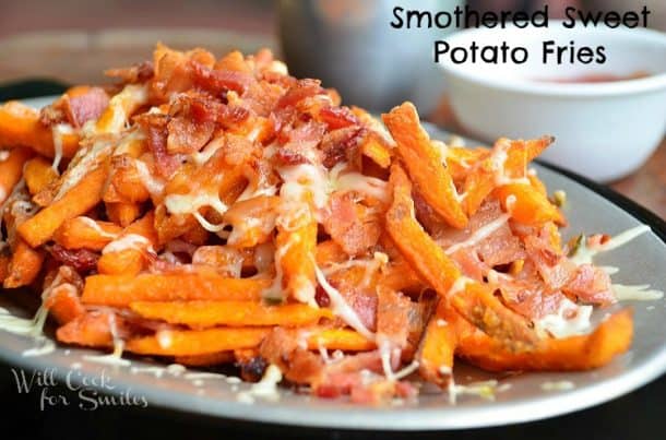 Smothered sweet potato fries on a plate