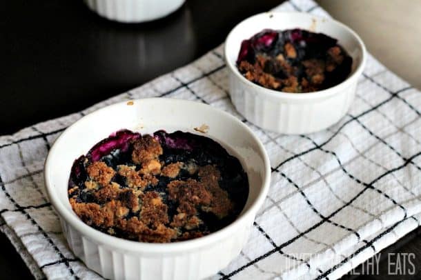 Two ramekins of Blueberry Cobbler