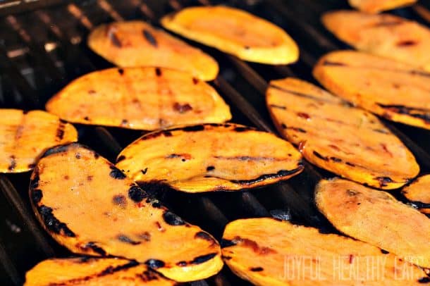 Sweet potato slices on a grill