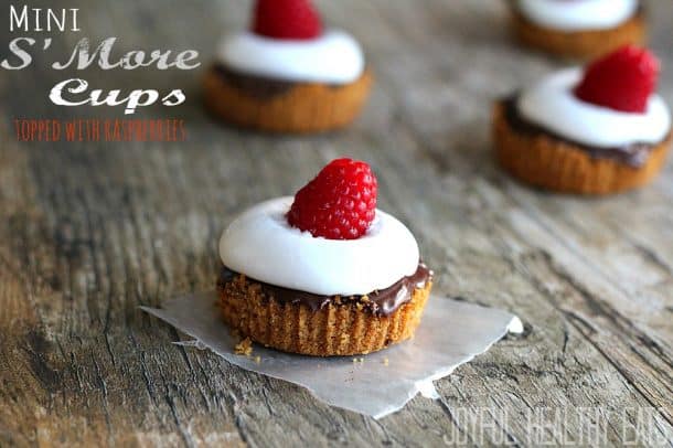 Mini S'mores Cups with raspberries on top.