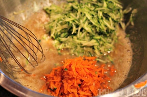 Shredded Carrot and Zucchini being added to batter for Carrot Zucchini Bread