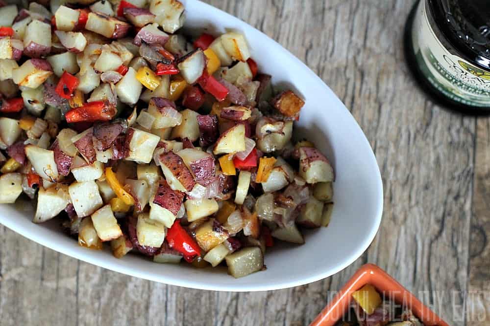 Diced Breakfast Potatoes with diced bell pepper in a serving bowl