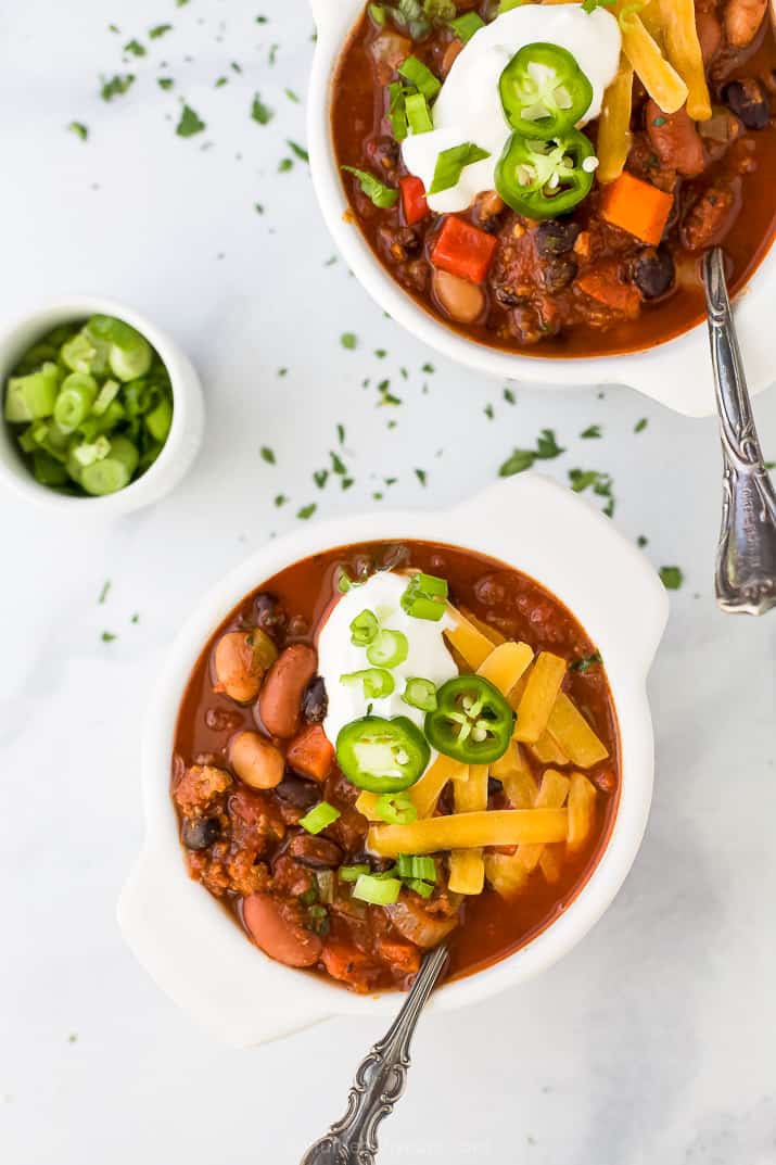 Two bowls filled with crock pot chili.