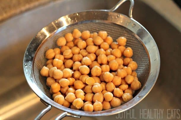 Chickpeas being drained