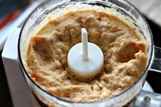 Pureed chick peas and tahini in a food processor