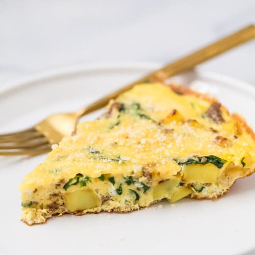 Potato frittata slice on a plate.