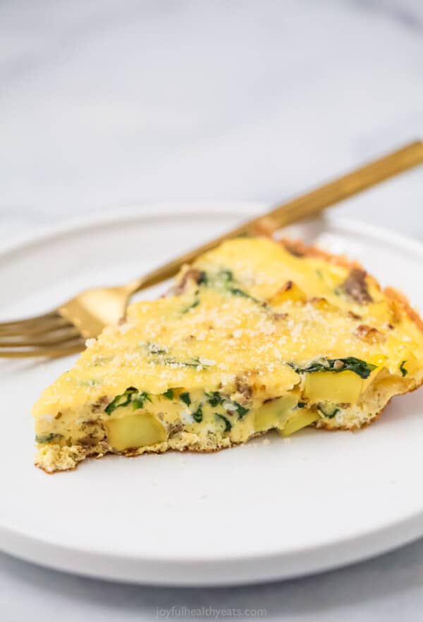 Potato frittata slice on a plate.